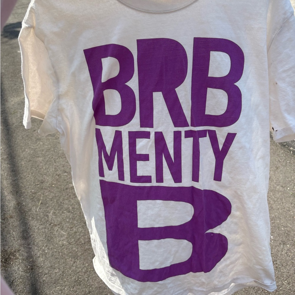 White T-Shirt with Purple Graphic